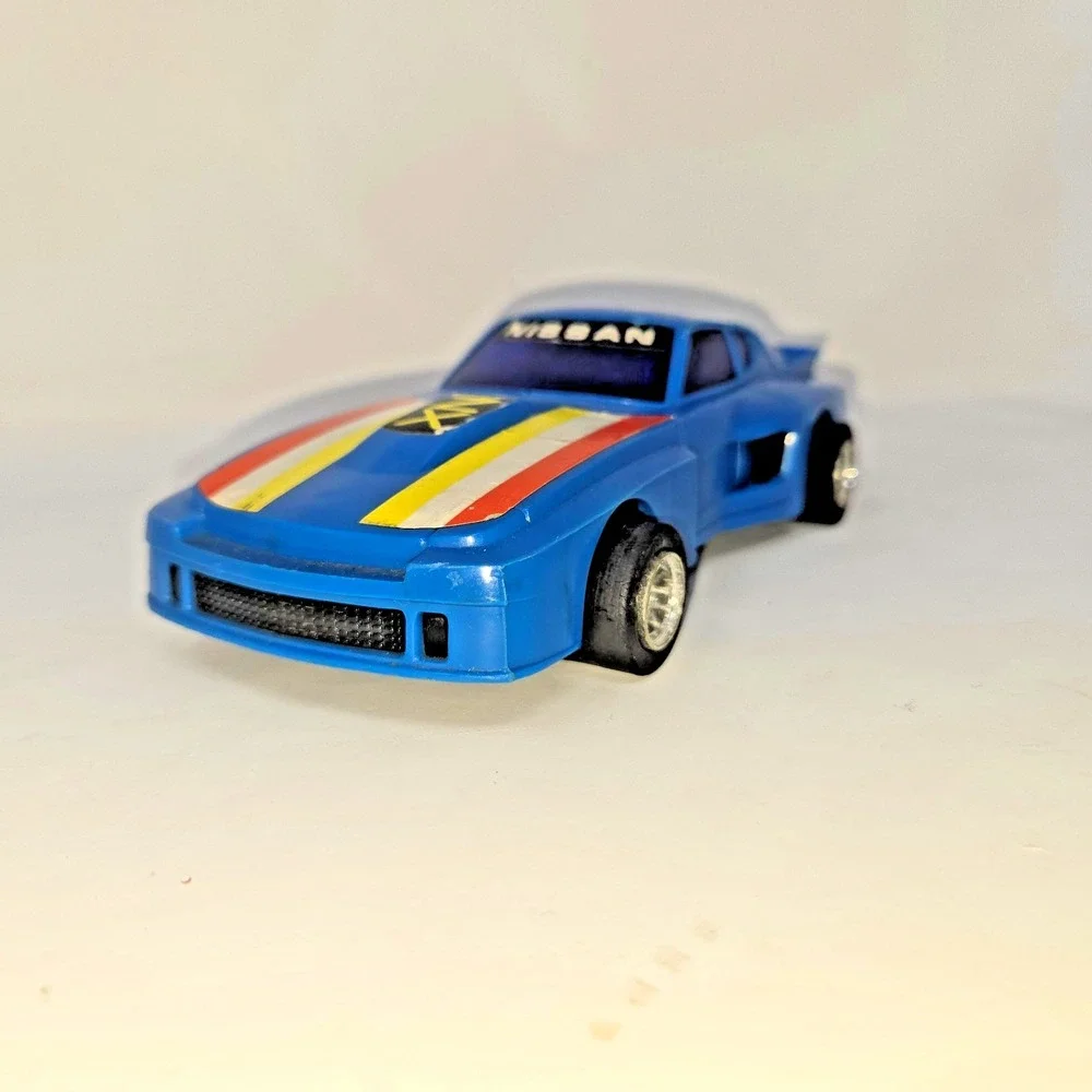 Lanard Toys Pull String Nissan ZX Blue Race Car Pull Cord 1982 Works Vintage